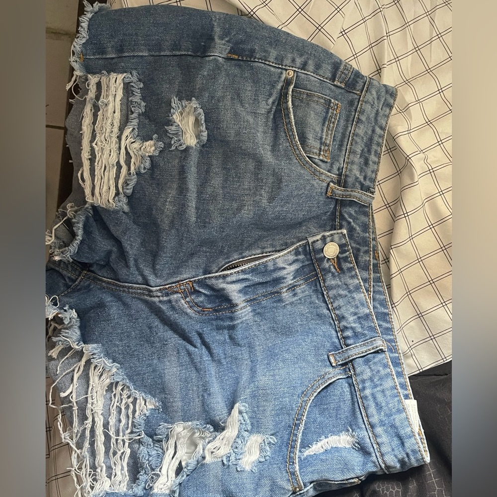 Super cute blue jean shorts. New. Size L
